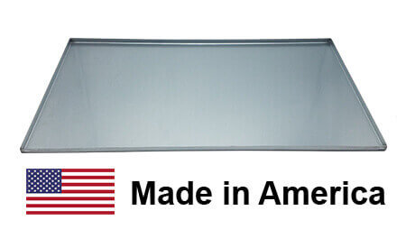 New Drip Pan Grease Tray grill part replacement. Material is Galvanized steel and the part is rectangular in shape. There is an American Flag and the Words "Made in America"